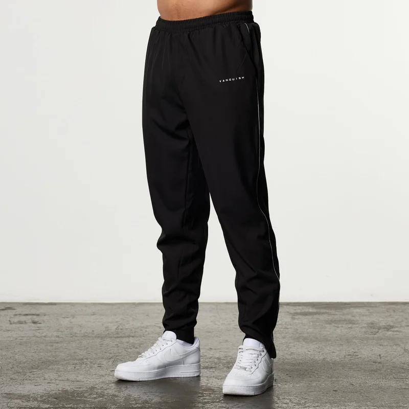 Image of ACADEMY BLACK PERFORMANCE WOVEN SWEATPANTS