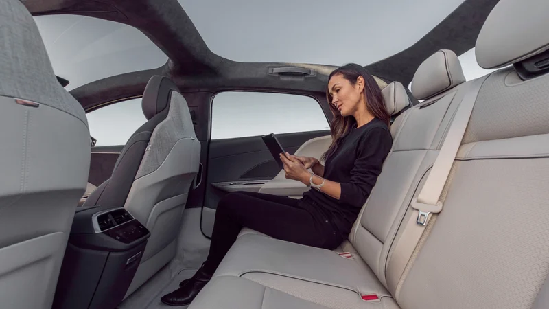 Person in the backseat of a Lucid Air