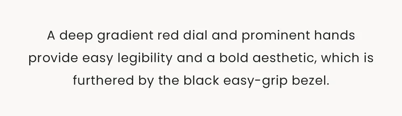 A deep gradient red dial and prominent hands provide easy legibility and a bold aesthetic, which is furthered by the black easy-grip bezel.