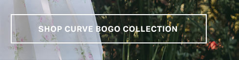 White 'SHOP CURVE discount code COLLECTION' text on a banner over a romantic floral fabric and vibrant green foliage, encouraging browsing the special plus-size sale.