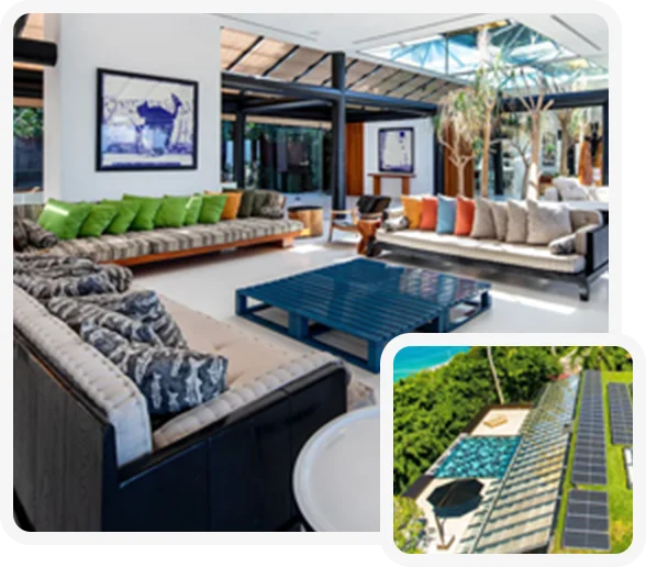 Bright modern living room with colorful seating, a skylight, and solar panels on the roof.