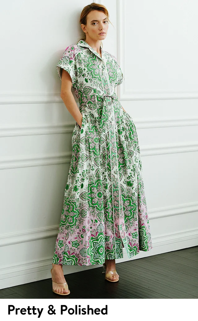 A woman wearing a floral-print shirtdress.