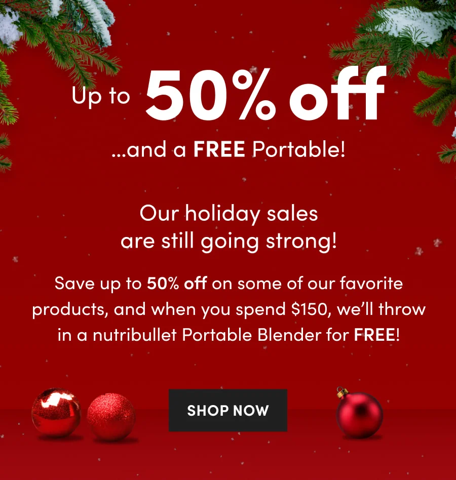 A red festive background with green pine needles and holiday ornaments framing the nutribullet holiday sale announcement for up to 50% off and a free portable blender.