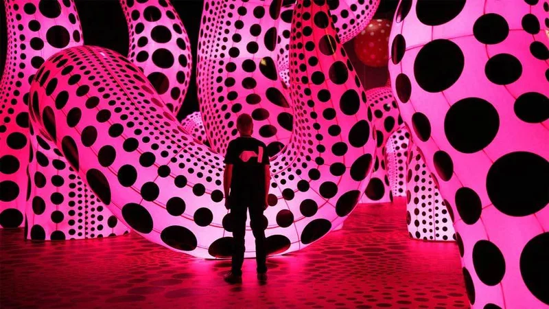 Image description: Yayoi Kusama's You, Me and the Balloons exhibits at the Factory International, Manchester, UK.