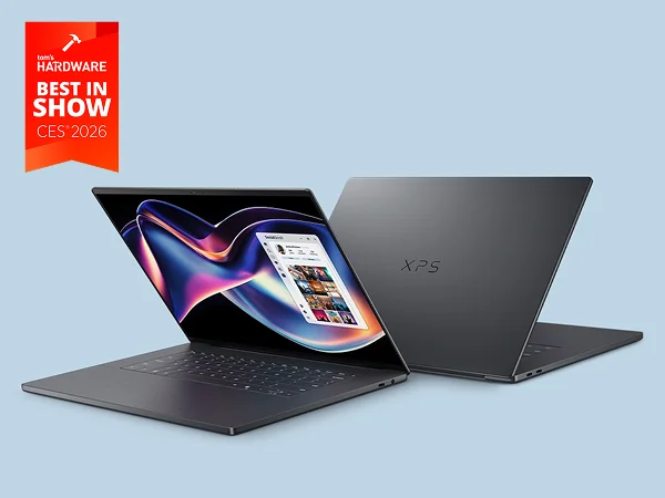 Two partially open XPS 16 laptop computers arranged back-to-back beneath a Tom’s Hardware Best in Show CES 2026 logo.