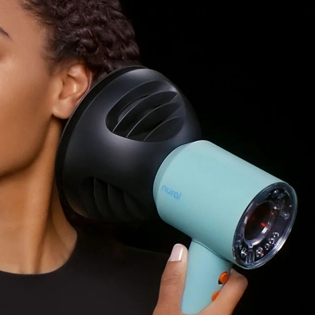 Model uses a Dyson Supersonic Nural hair dryer