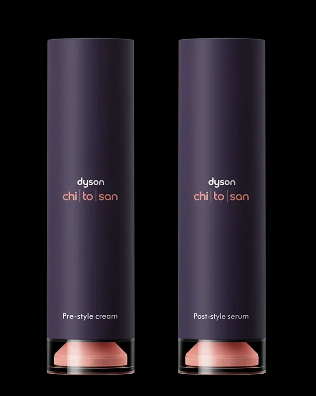 Two bottles of Dyson Chitosan Pre-style cream and Post-style serum