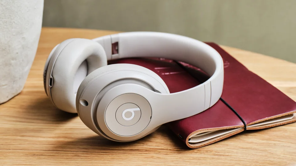 Beats Studio Pro headphones sitting on a table.