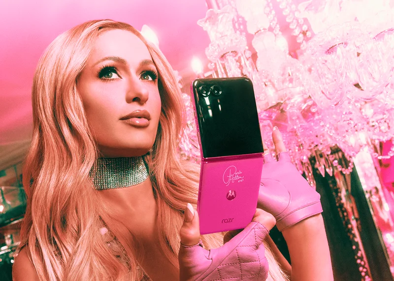 Paris Hilton holding the new motorola razr+ Paris Hilton Edition