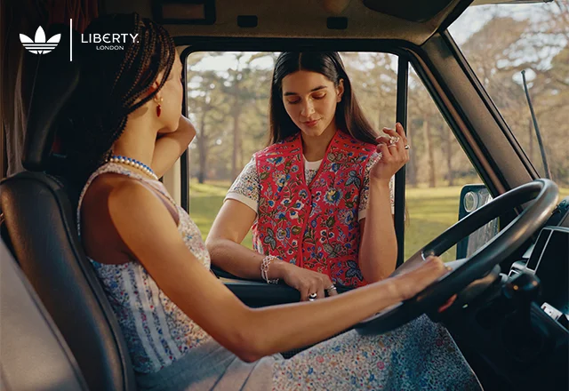 Women sitting in the car wearing floral print clothes