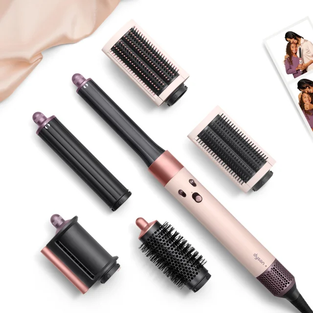 The Dyson Airwrap in Ceramic pink and rose gold with accessories