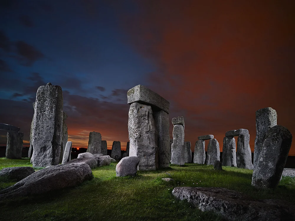 Stonehenge as shown in layered exposure throughout a sunset