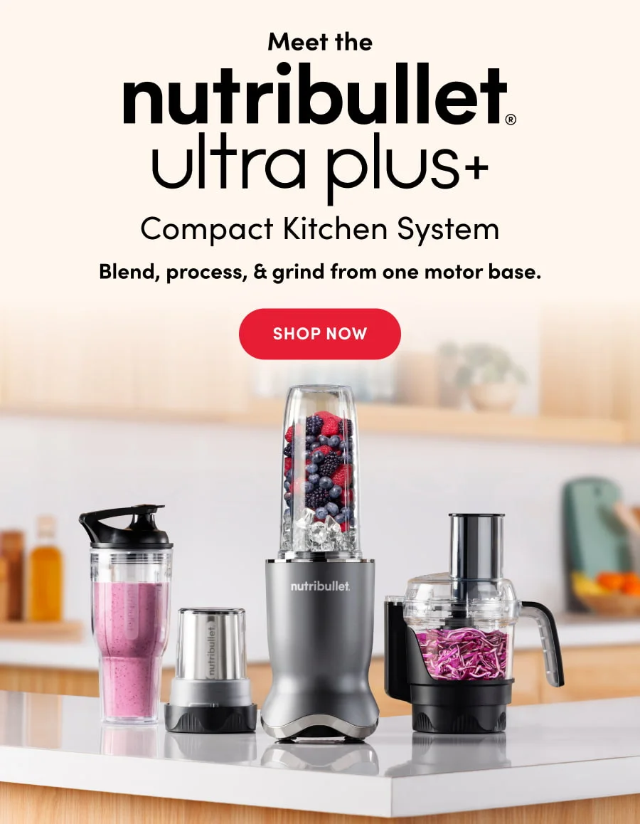 Image of a gunmetal color nutribullet Ultra Plus with attachments standing on the kitchen’s countertop.