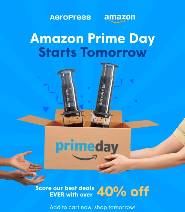 Amazon Prime Day Starts Tomorrow.  Box with two AeroPress, hands receiving.