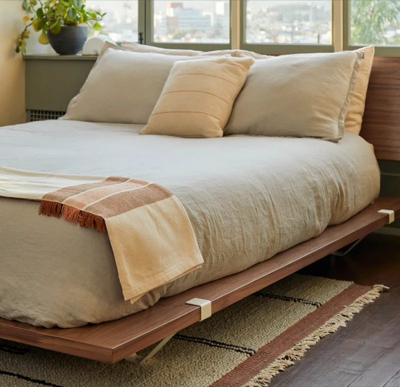 Pictured: The Floyd Bed with Headboard in Walnut & White