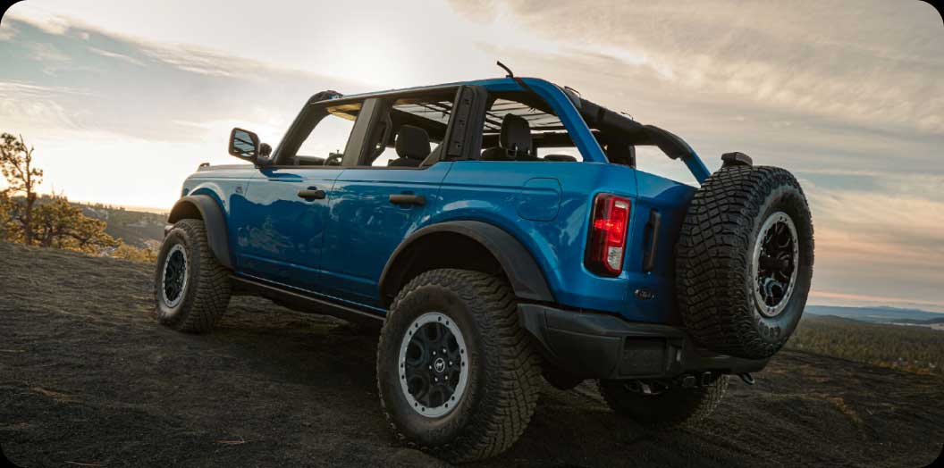 A Ford parked off-road.