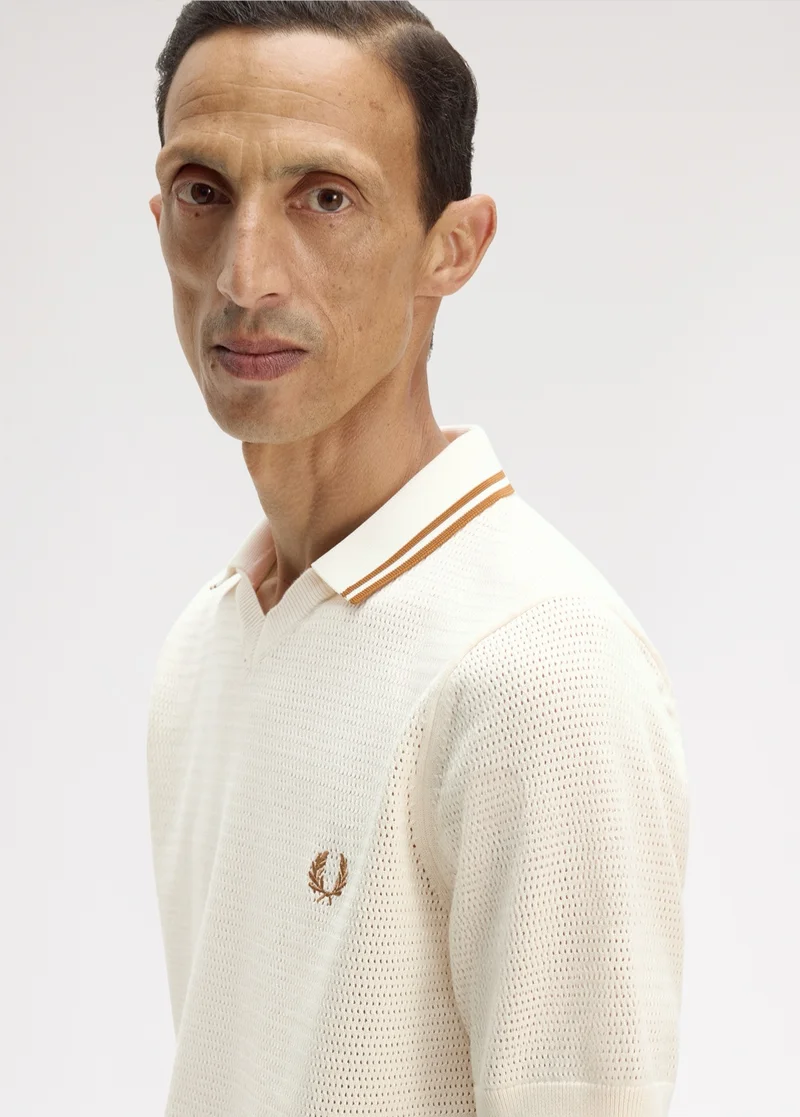 Male model wearing a Fred Perry Pointelle Knitted Shirt in Ecru