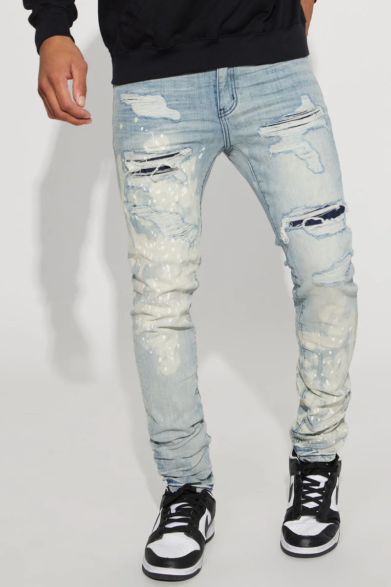 Image of For It Paint Splattered Stacked Skinny Jeans - Light Wash