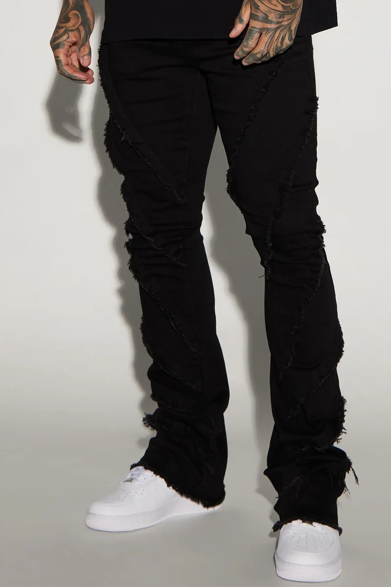 Image of Slanted Fray Stacked Skinny Flare Jeans - Black