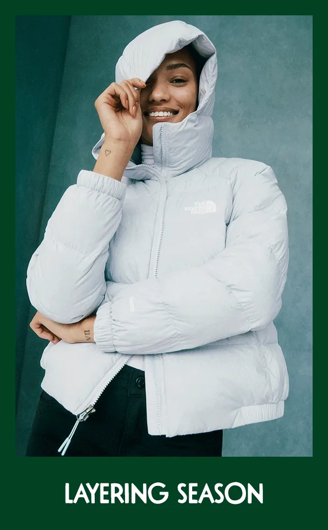 Woman wearing a parka. Fleece pullover.