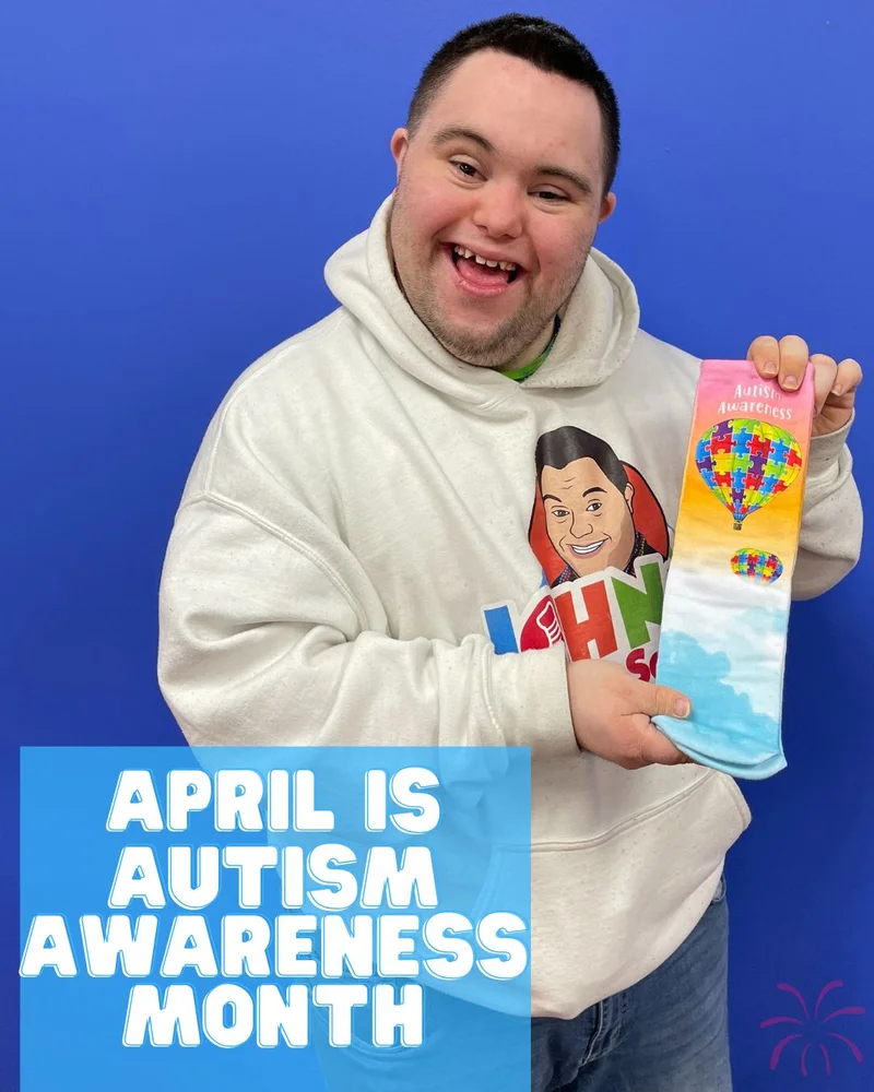 John with our autism awareness socks