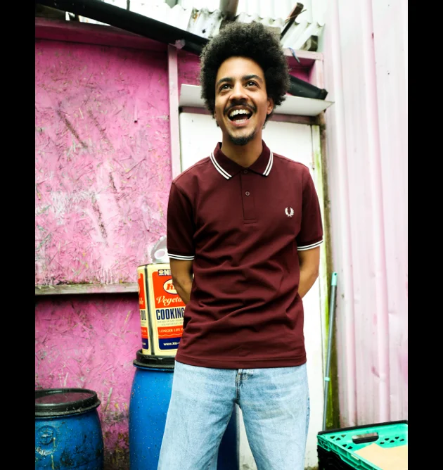 Male Fred Perry Ambassador wearing a Fred Perry Shirt
