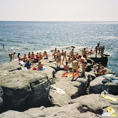Pantelleria's dramatic cliffside landscape above the Mediterranean is ideal for both wine growing and swimming.