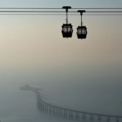 The Ngong Ping cable car in Hong Kong offers riders views of the stretch of the South China Sea. Somewhere along its coastline the 16th-century settlement of Tamão is said to be buried.