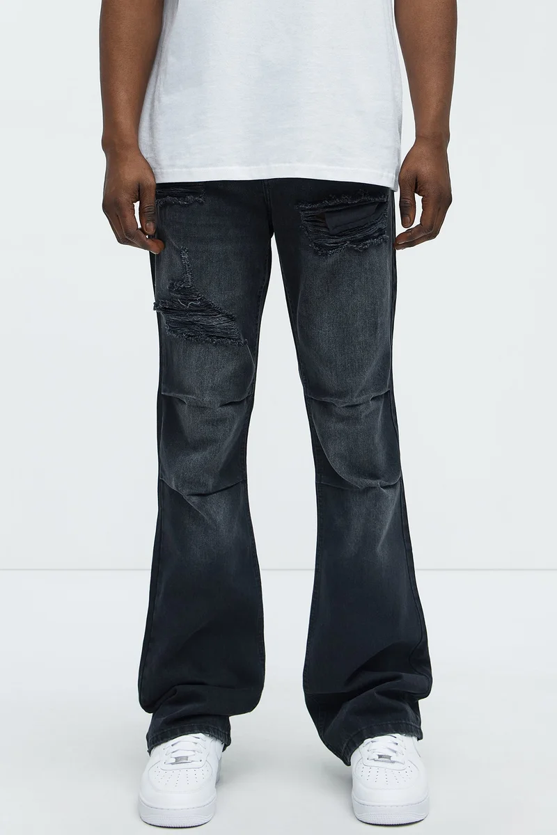 Image of Out And About Ripped Stacked Slim Flare Jeans - Black Wash
