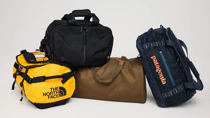 Image may contain: Bag, Accessories, Handbag, Backpack, and Baggage best duffel bags