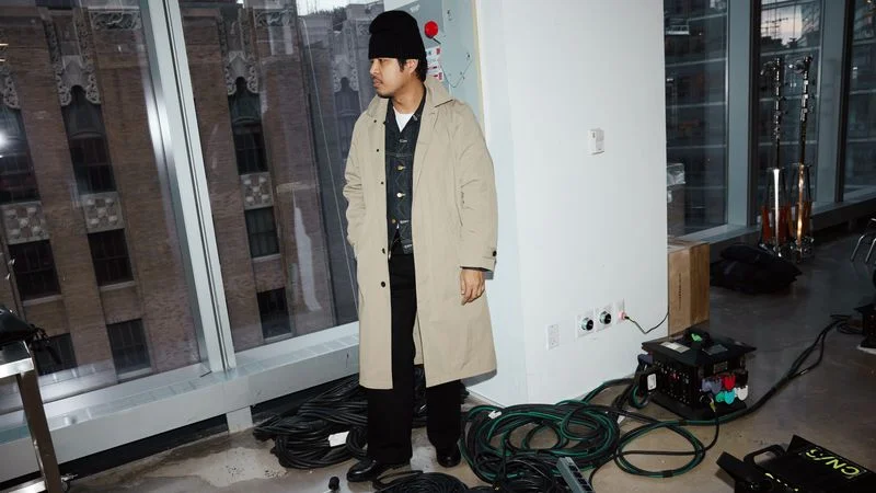 GQ writer Gerald Ortiz wearing a $350 Madewell trench coat.