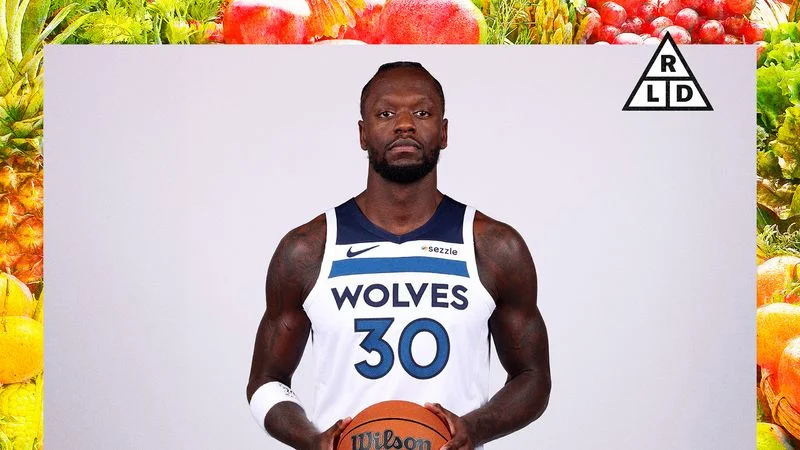 Image may contain: Julius Randle, Ball, Basketball, Basketball (Ball), Sport, Face, Head, Person, Photography, and Portrait