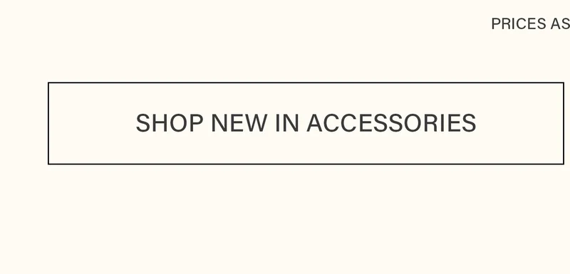 Light beige banner with a dark grey 'SHOP NEW IN ACCESSORIES' button in a black box. Explore and buy our latest fashion accessories.