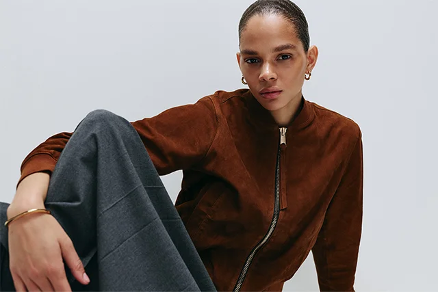 Woman wearing Anniversary Sale styles.