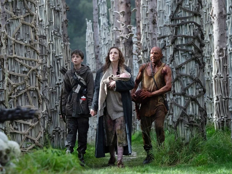Alfie Williams, Jodie Comer, and Ralph Fiennes in '28 Years Later.'