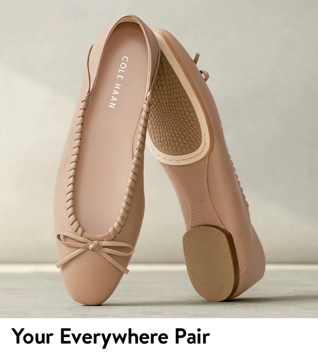 A pair of tan ballet flats.