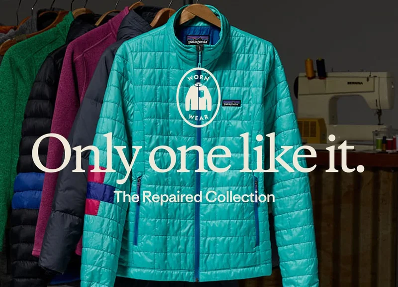 Only one like it. The Repaired Collection. A studio photo of mended jackets on a clothing rack.