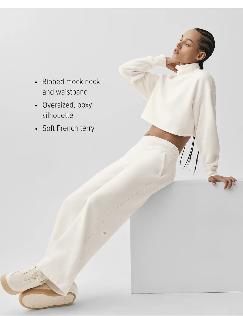 • Ribbed mock neck and waistband • Oversized, boxy Silhouette • Soft French terry
