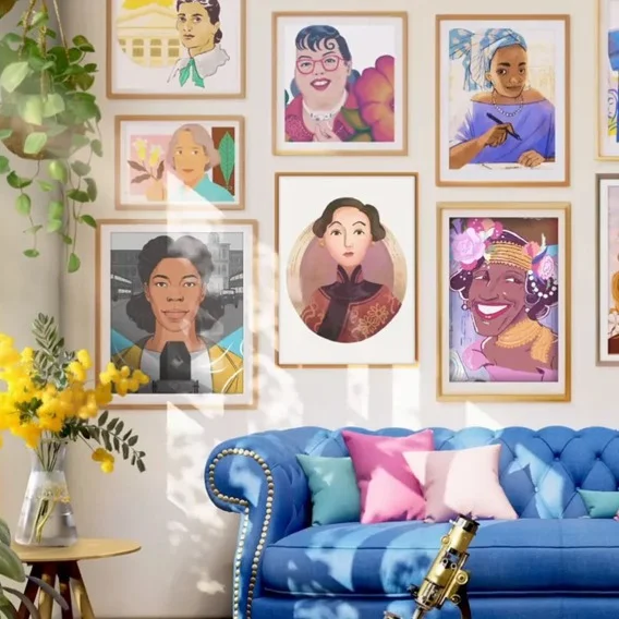 Picture of a wall with several portraits of women from history