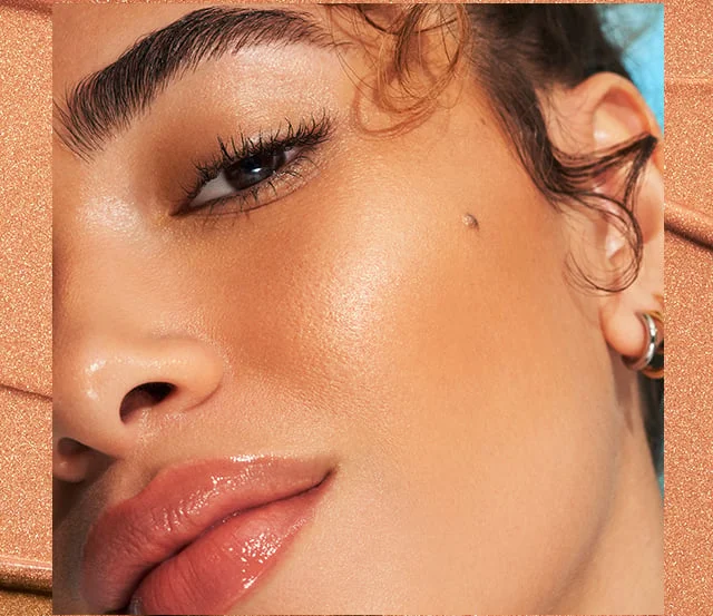 Model wearing Bronzing Drops