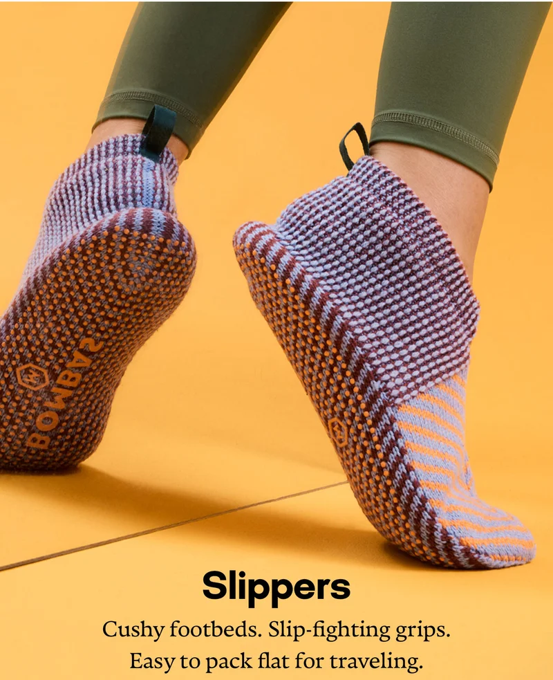 Slippers | Cushy footbeds. Slip-fighting grips. Easy to pack flat for traveling.