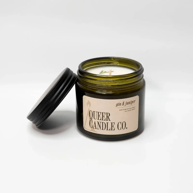 Candle reading "Queer Candle Co."