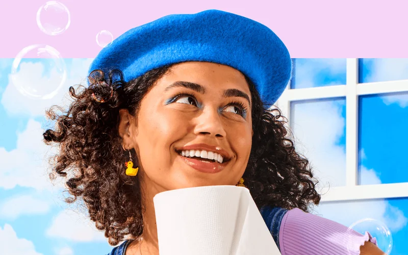 Image: Artsy woman holding Who Gives A Crap Poetry Edition TP