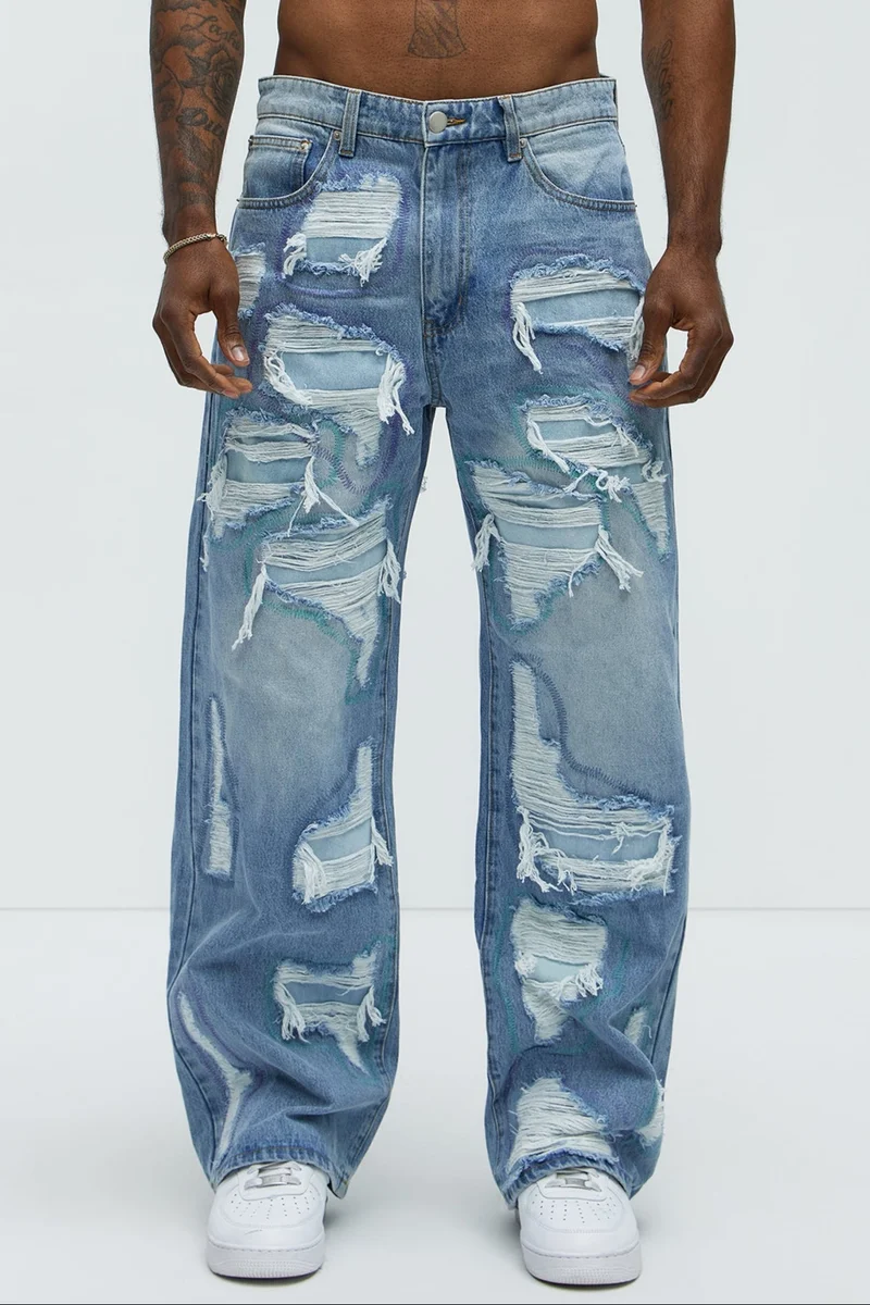 Image of Worn All Over Distressed Baggy Jeans - Light Wash