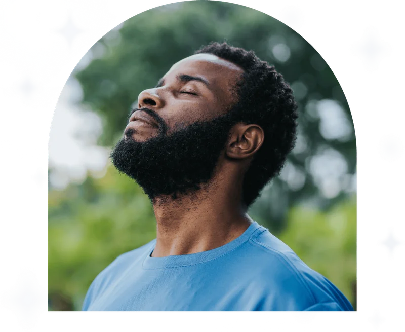 Portrait of a man breathing fresh air in nature