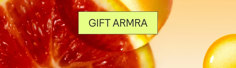Close-up of sliced blood oranges with a “Gift ARMRA” call-to-action button overlaid.