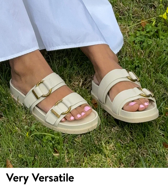 Model wearing Dolce Vita sandals.