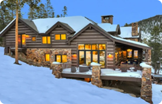 Cozy up in a private mountain lodge with snow-covered surroundings in Aspen, Colorado.