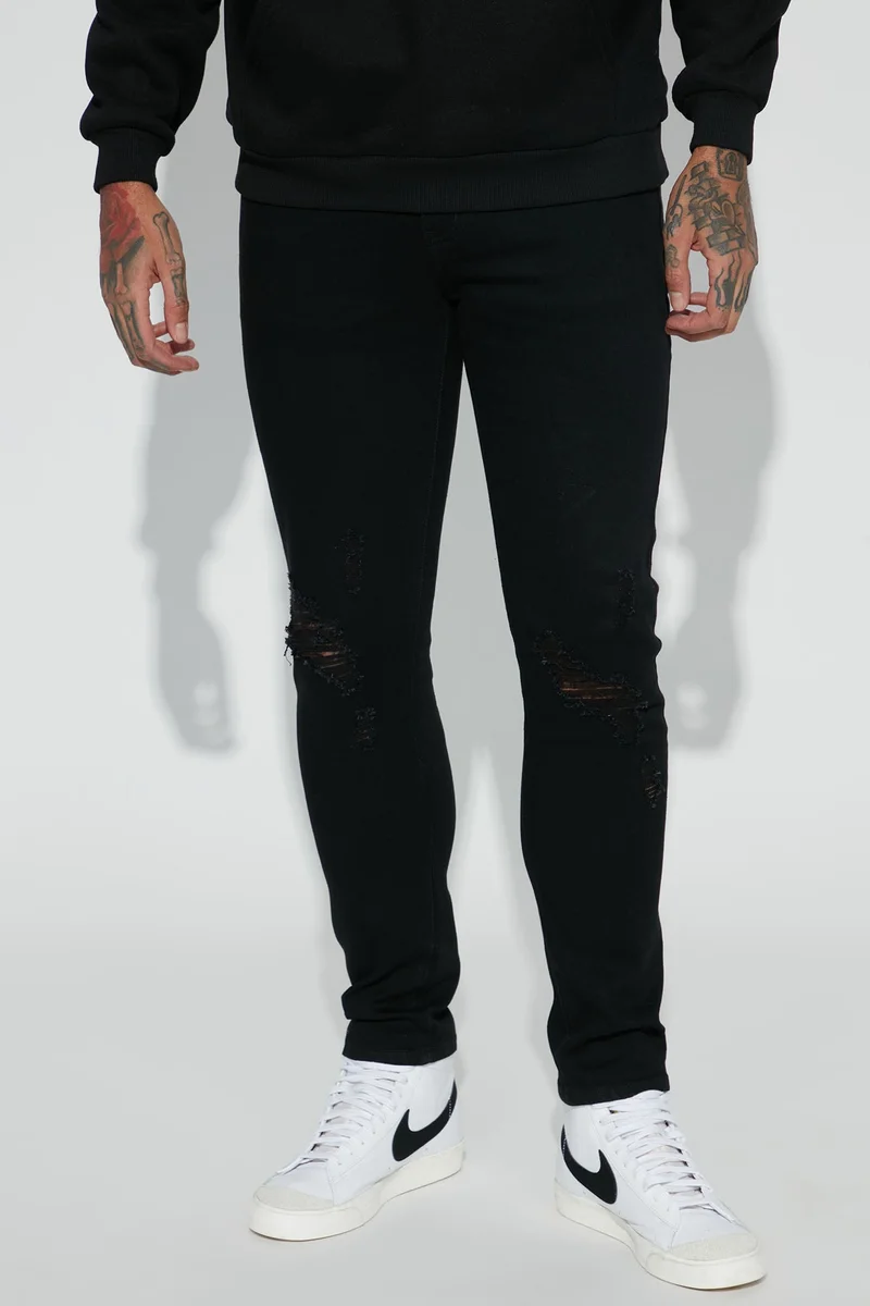Image of Jasper Skinny Ripped Knee Jeans - Black