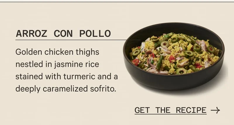 ARROZ CON POLLO | Golden chicken thighs nestled in jasmine rice stained with turmeric and a deeply caramelized sofrito. | GET THE RECIPE